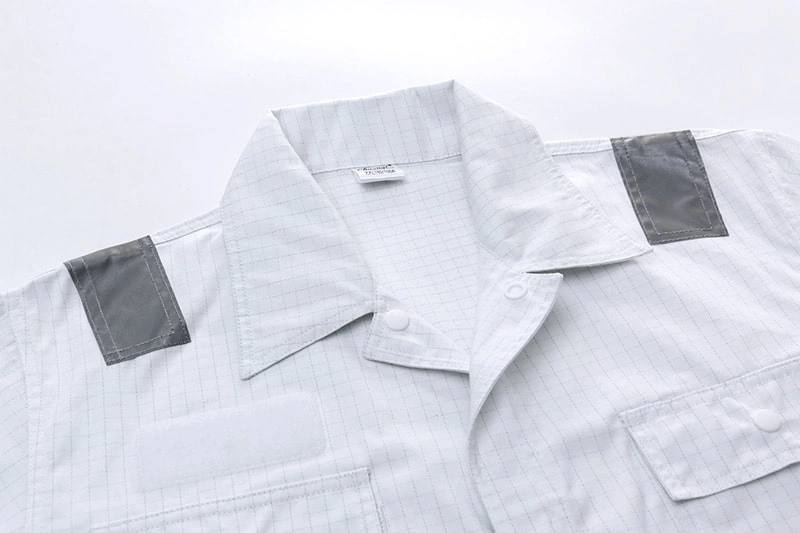 Can you provide written specifications for the fabric weight, composition, and abrasion resistance of the crew coveralls?