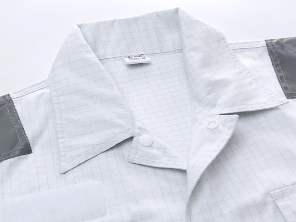 When selecting one-piece work coveralls for crew members, what craftsmanship details should you focus on