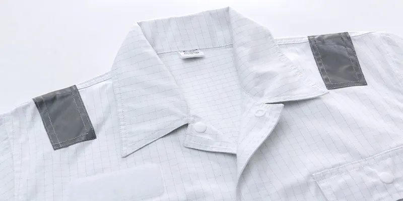 When selecting one-piece work coveralls for crew members, what craftsmanship details should you focus on